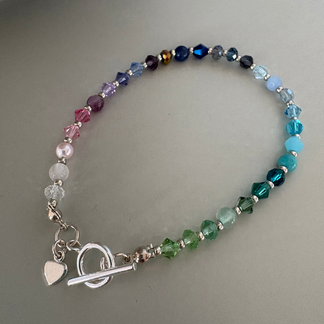 Colourful Handmade Rainbow Bead Bracelet with Sterling Silver Clasp and Heart Charm Detail | Gift for Her