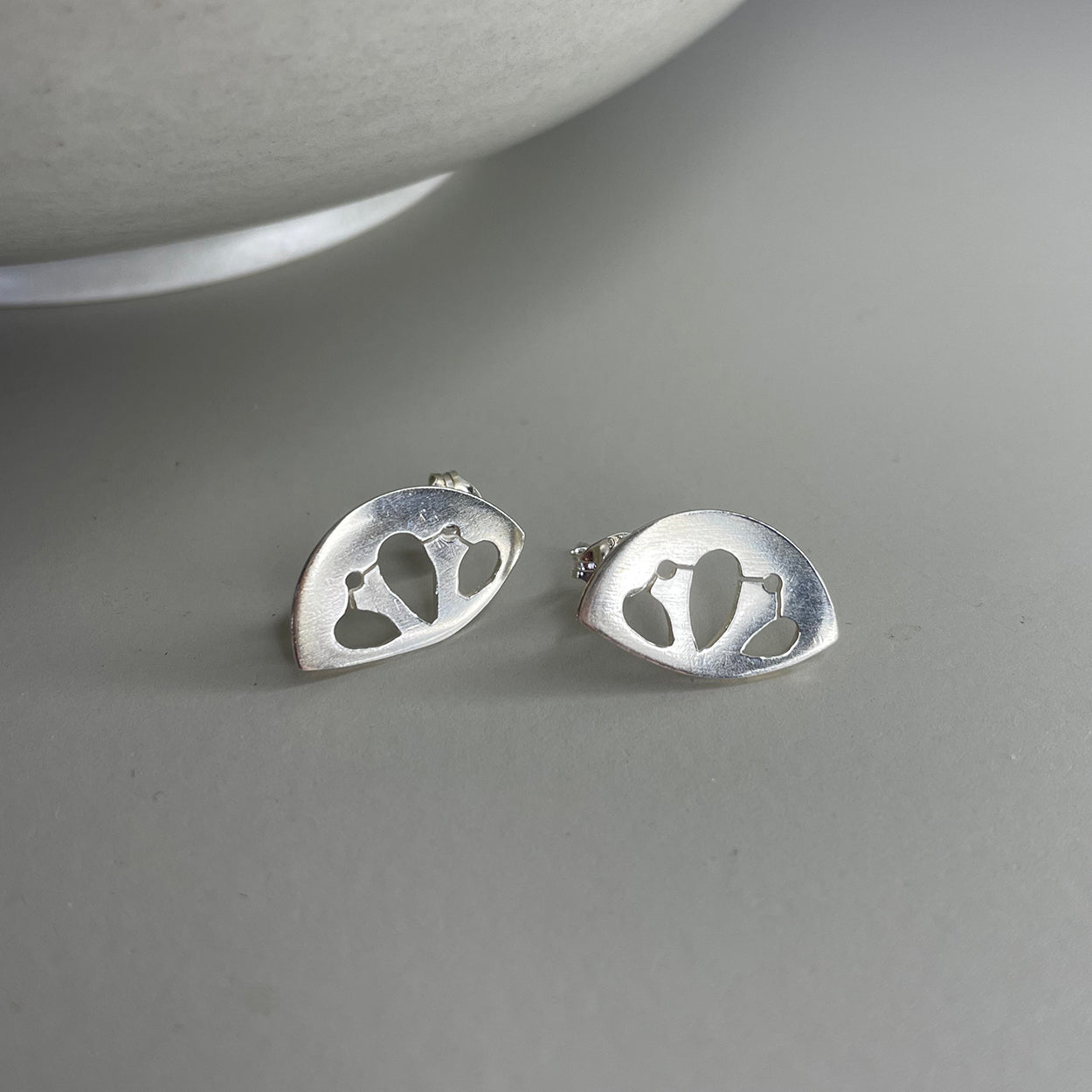 Sterling silver decorative cut out patterned post earrings
