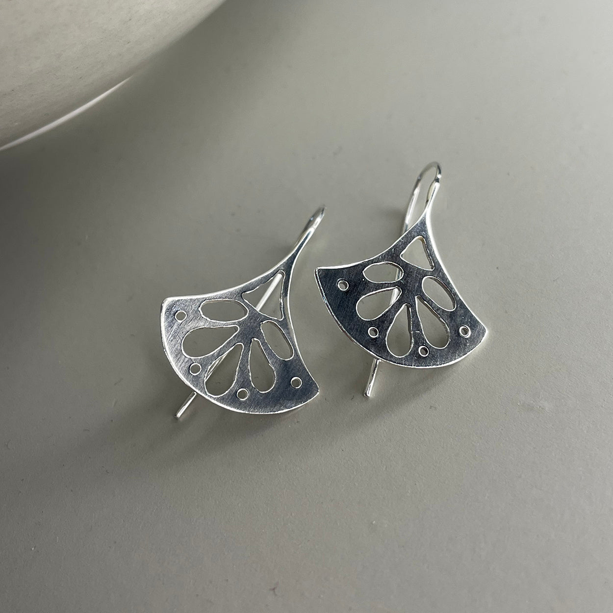 Sterling silver decorative cut out pattern fan drop earrings